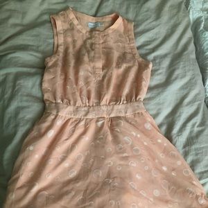 Peach boutique dress with circle detail